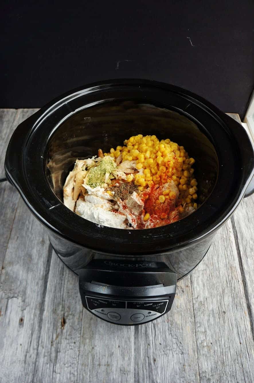 Slow cooker chicken corn chowder ingredients in the crock pot