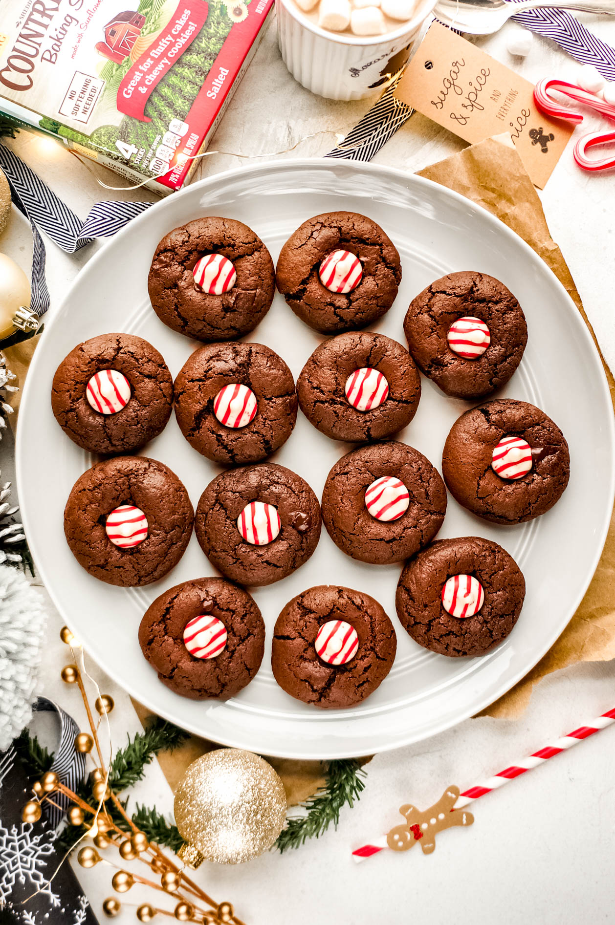 Double Chocolate Peppermint Kiss Cookies are super rich and fudgy chocolate cookies topped with a peppermint kiss. Perfect for any cookie exchange! chocolatepeppermintcookies 2