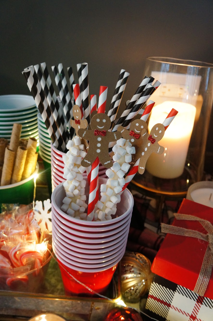 hot cocoa bar gingerbread man straws at hot cocoa bar