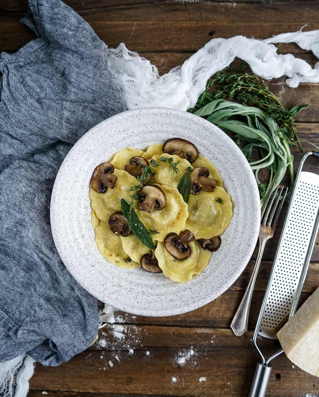 Mushroom Ravioli with Brown Butter Sauce Mushroom Ravioli with Brown Butter Sauce plated in bowl