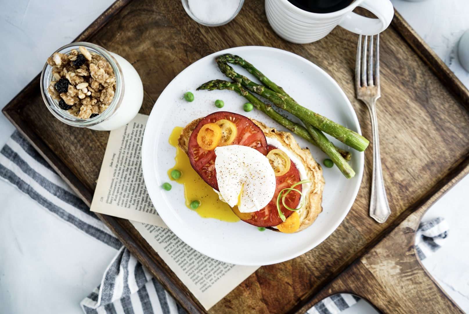 tomato toast with poached egg overhead shot of tomato toast with poached egg