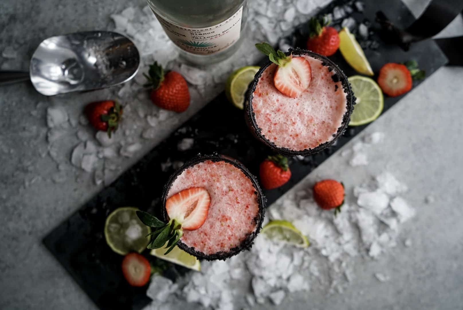 Strawberry Lime Margarita Strawberry Lime Margaritas on serving plate garnished with fresh strawberries