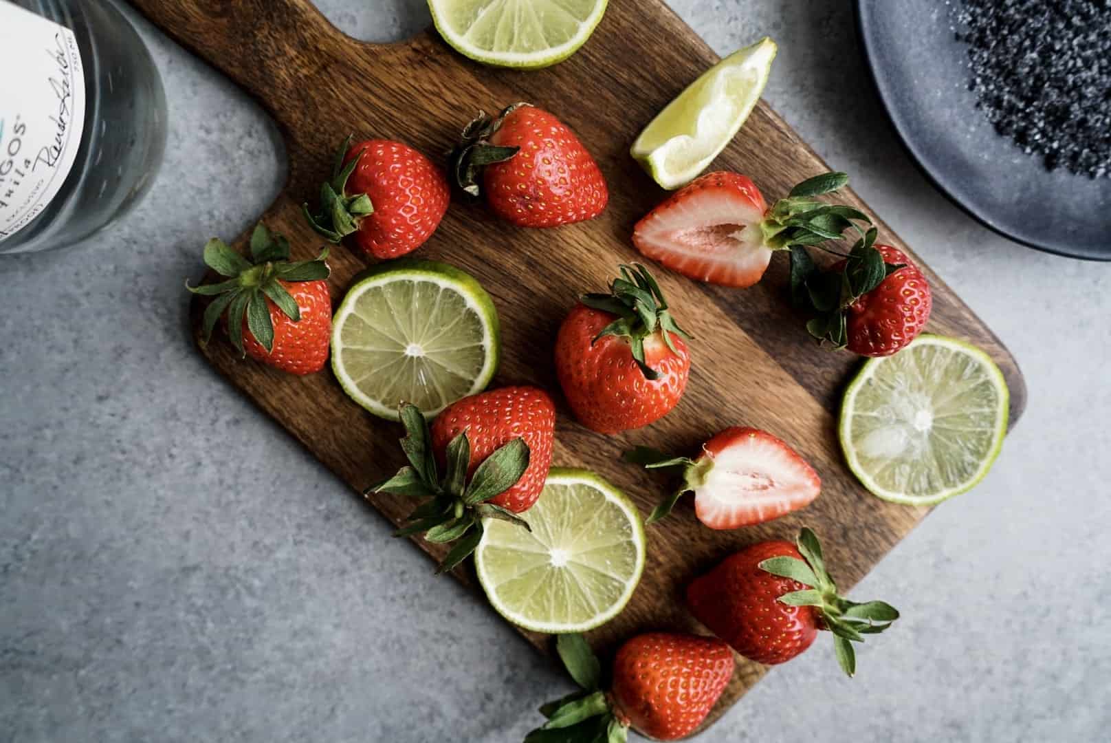 fresh strawberries and limes