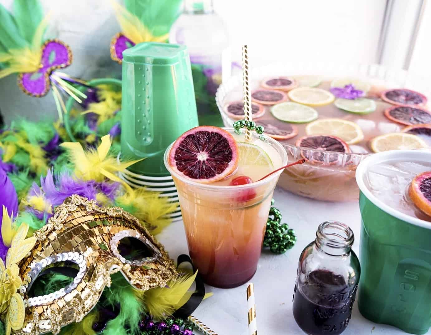 Hurricane Punch bowl Hurricane Punch bowl with mardi gras decor surrounding