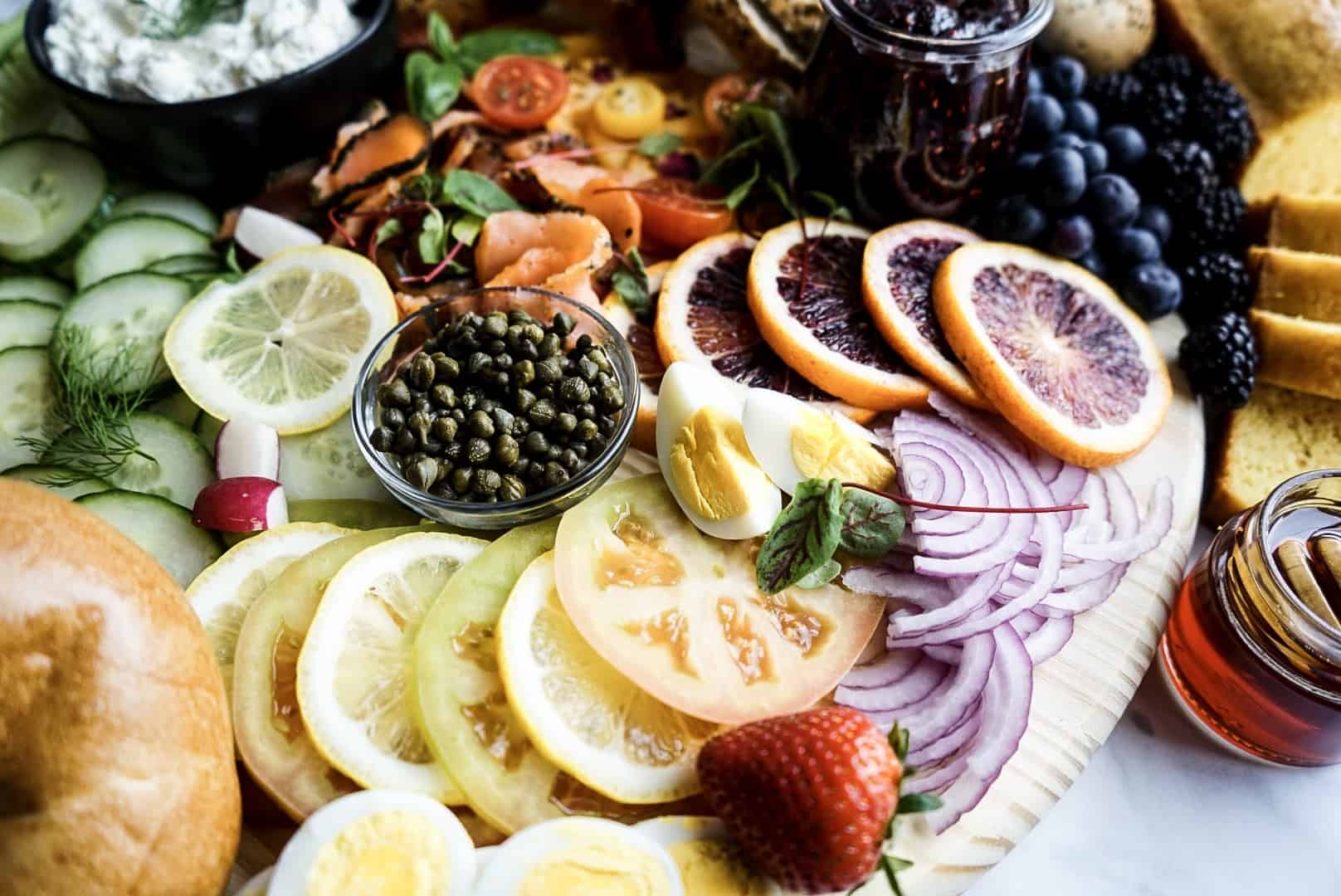 ingredients on a breakfast bagel board