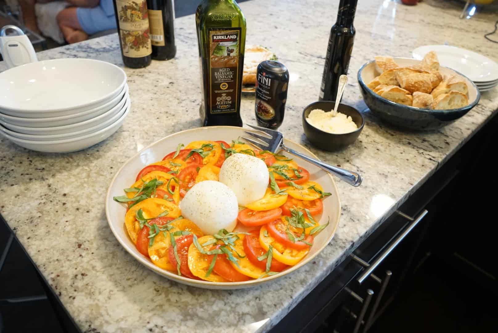 Spaghetto al Pomodoro heirloom caprese salad