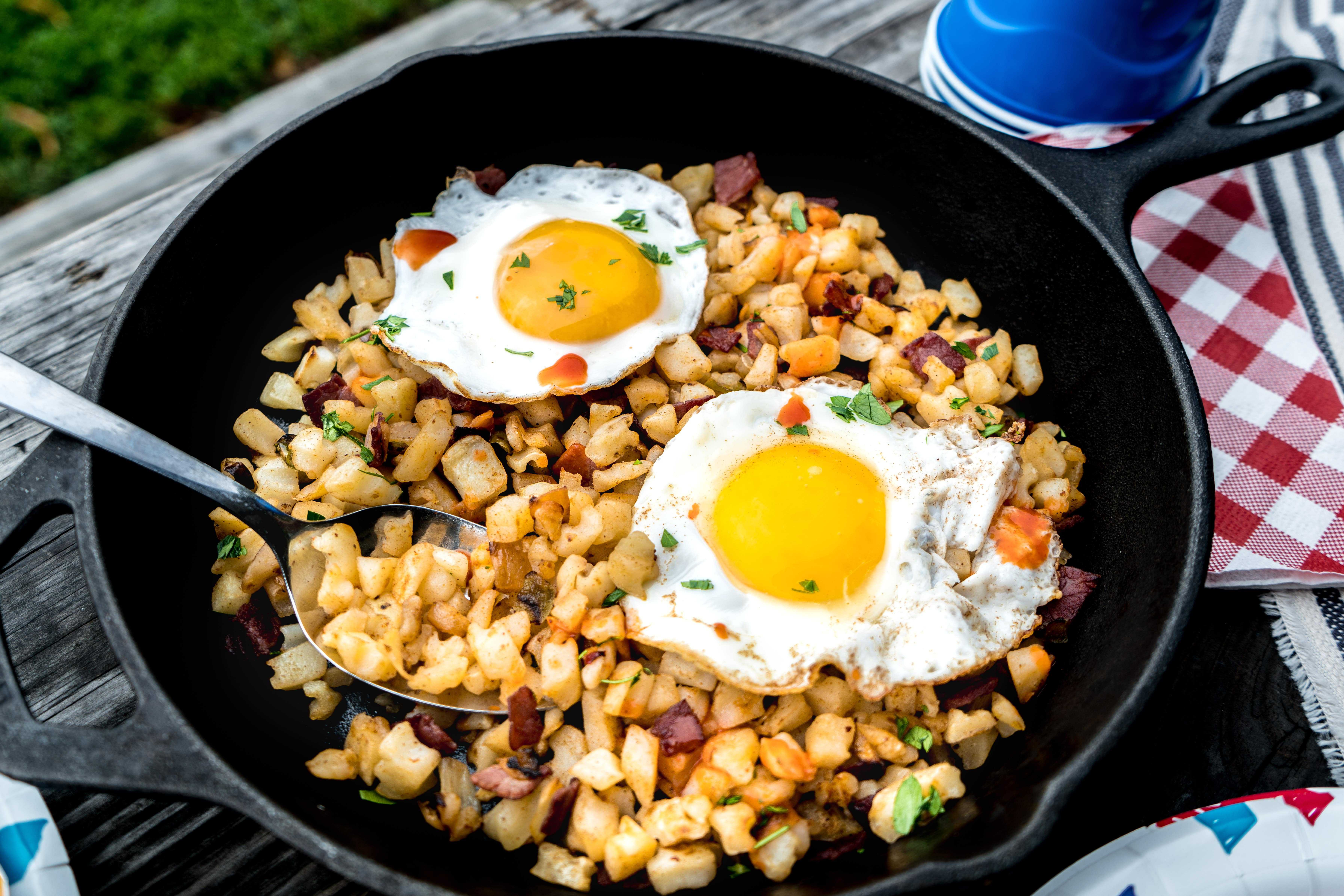 camping recipes corned beef hash and eggs in skillet
