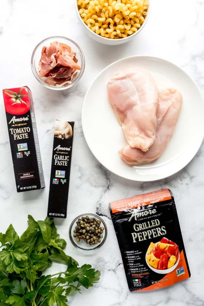 creamy roman chicken pasta ingredients on marble