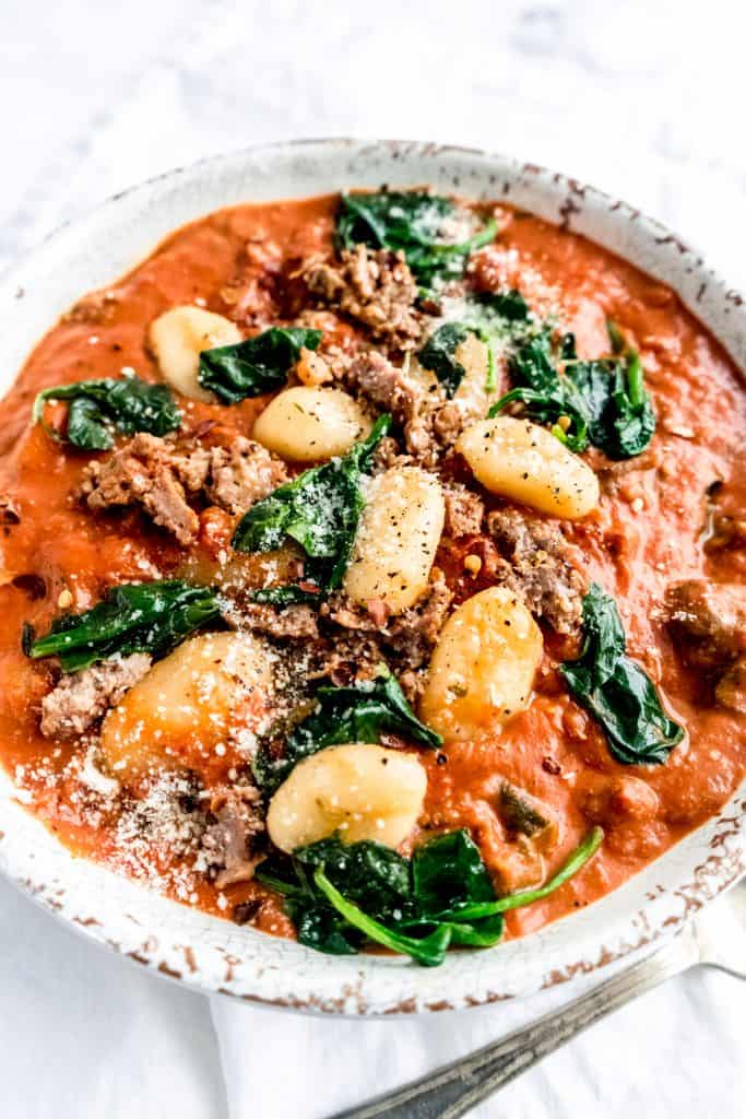 side view of sausage and gnocchi soup