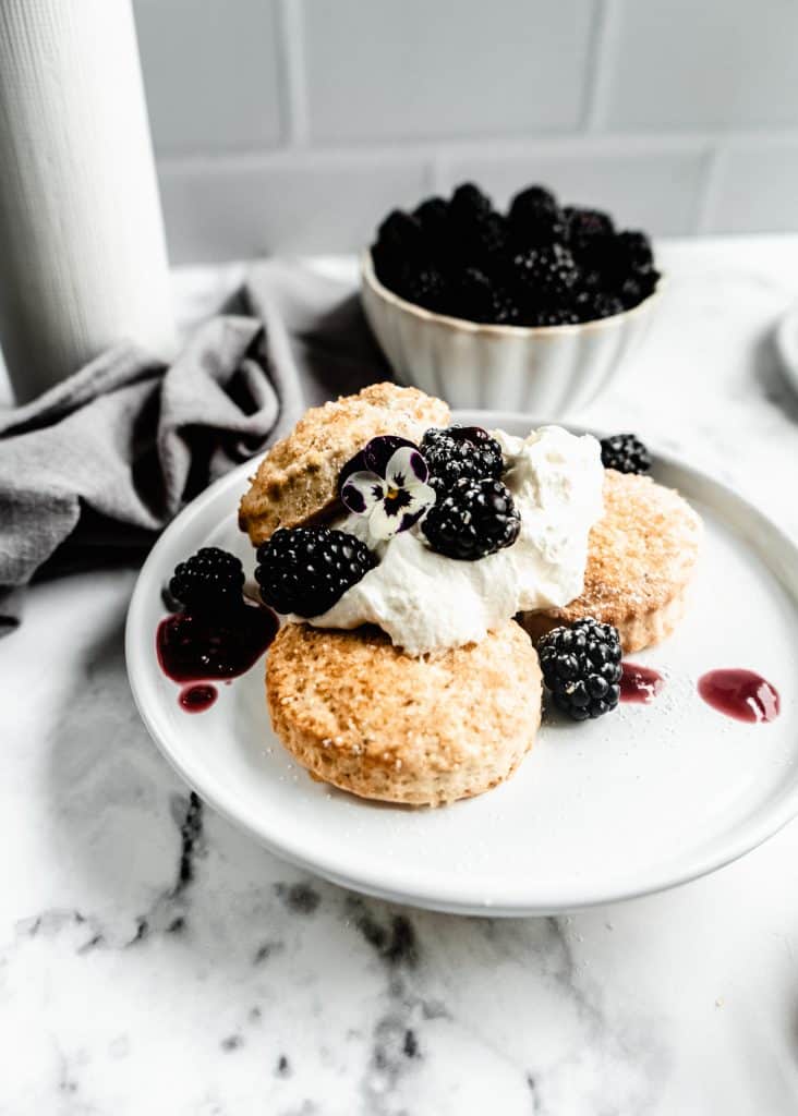 lavender blackberry shortcakes assembled on plate