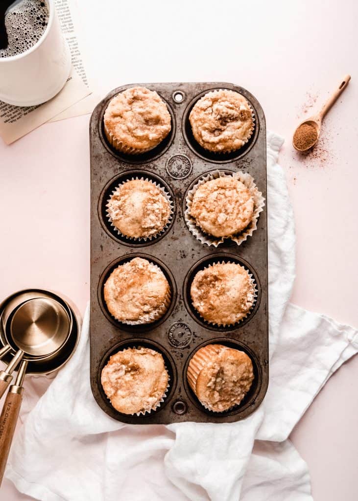 overhead shot of banana streusel muffins in muffin tin