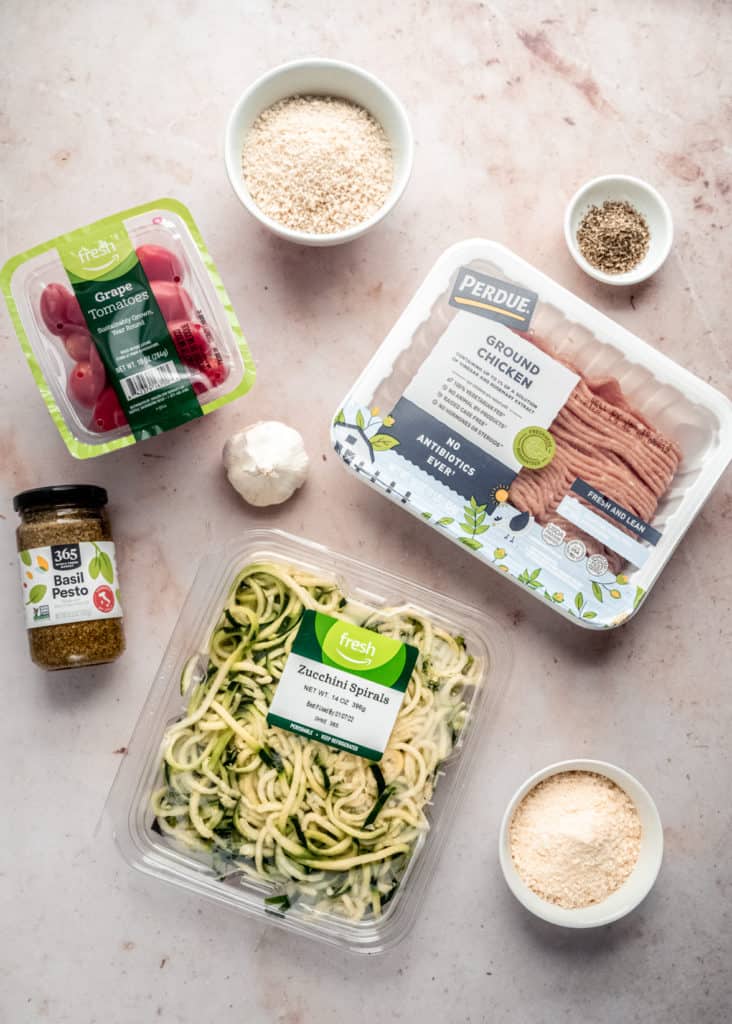 ingredients for pesto zucchini noodles on countertop
