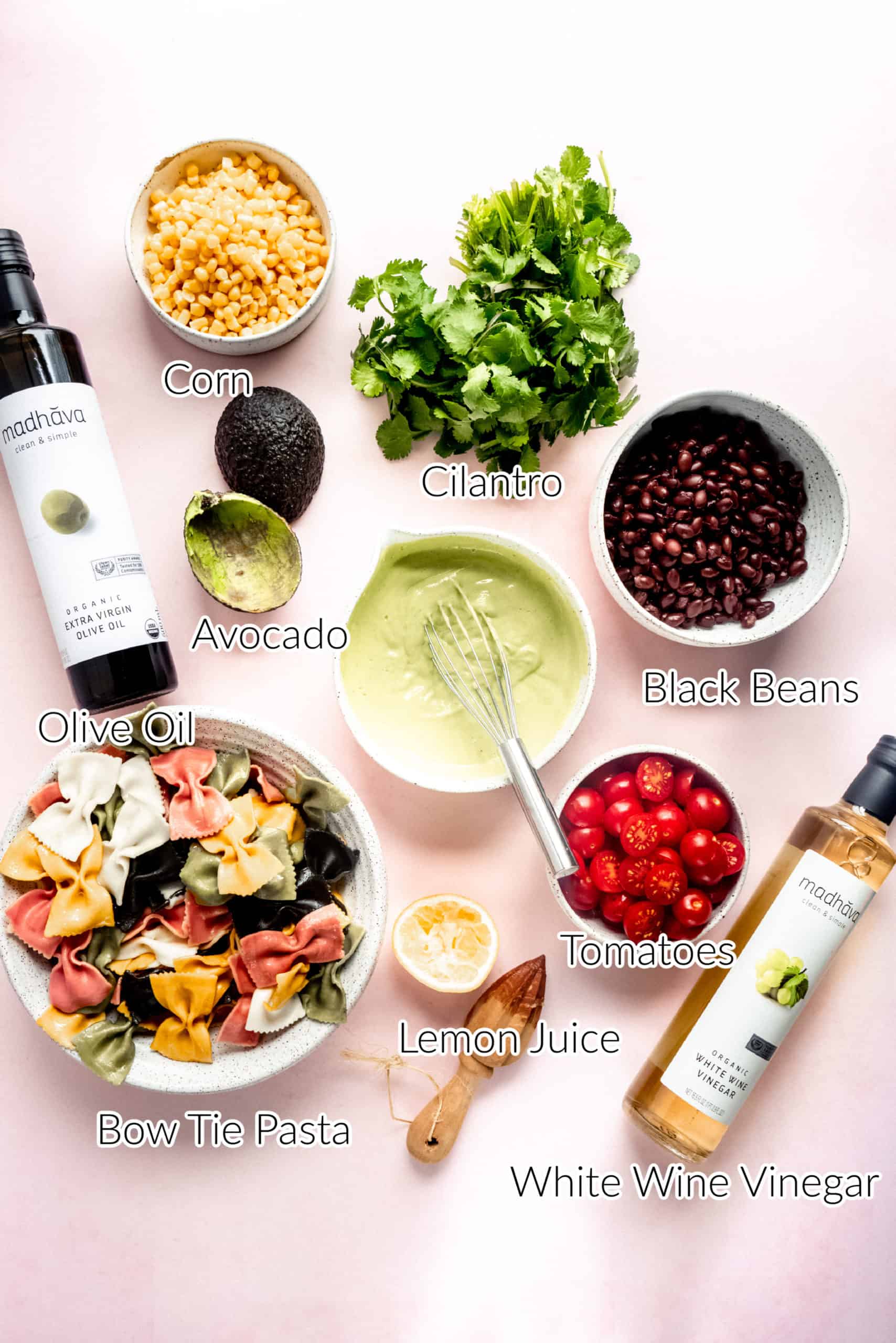 ingredients to make mexican pasta salad in individual bowls