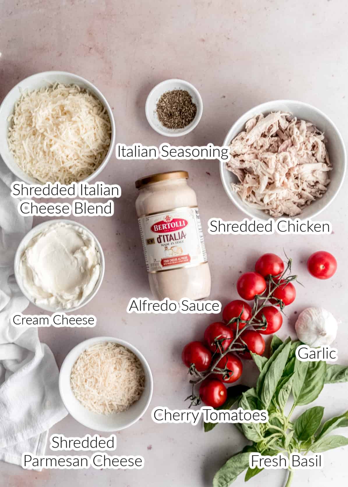 chicken alfredo dip ingredients in separate bowls